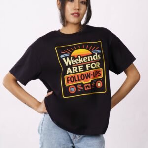 Stylish woman wearing an oversized t-shirt with 'Weekends are for Follow-ups' print, casual look.